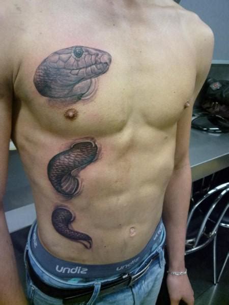 snake tattoo on waist.